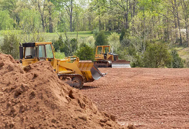 Cleared Boonville lot prepared for fence installation and improved equipment access